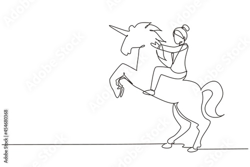 Single one line drawing businesswoman riding unicorn symbol of success. Business startup concept, looking at the goal, achievement, leadership. Continuous line draw design graphic vector illustration