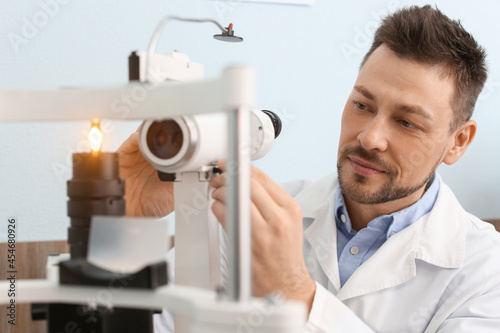Portrait of male ophthalmol...