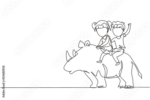 Single one line drawing happy boy and girl riding rhino rhinoceros together. Children sitting on back rhinoceros in zoo. Kids learning to ride rhinoceros. Continuous line draw design graphic vector