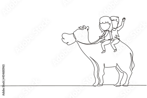 Single one line drawing happy little boy and girl riding camel together. Children sitting on hump camel with saddle in desert. Kids learning to ride camel. Continuous line draw design graphic vector