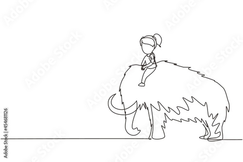 Single continuous line drawing little girl caveman riding woolly mammoth. Young kid sitting on back of mammoth. Stone age children. Ancient human life. One line draw graphic design vector illustration