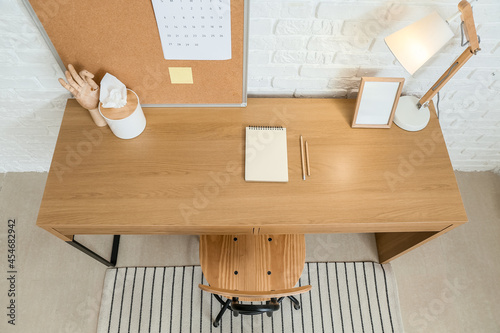 Modern workplace with noteb...