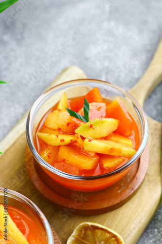 Asinan Buah or Indonesian pickled mixed fruits, spicy sweet and sour taste.   photo