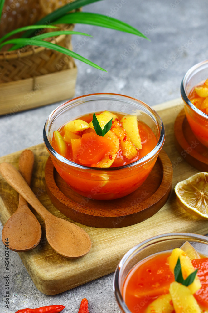 Asinan Buah or Indonesian pickled mixed fruits, spicy sweet and sour taste. Asinan Buah or Indonesian pickled mixed fruits, spicy sweet and sour taste.