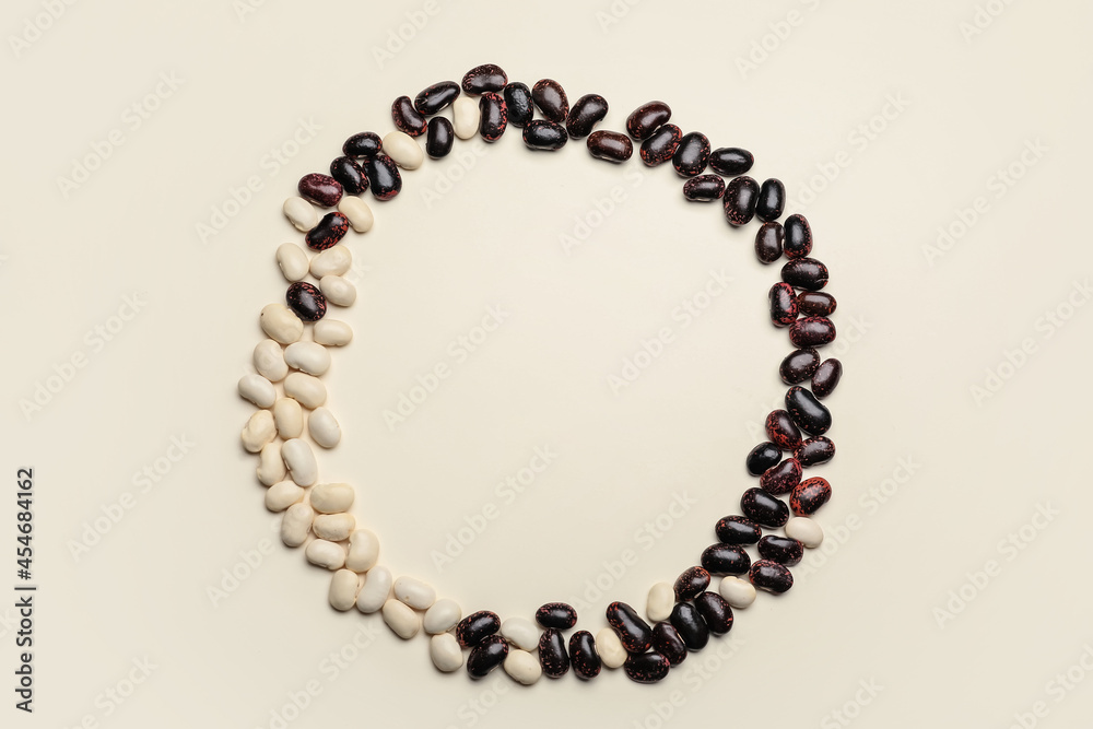 Obraz premium Frame made of raw beans on white background