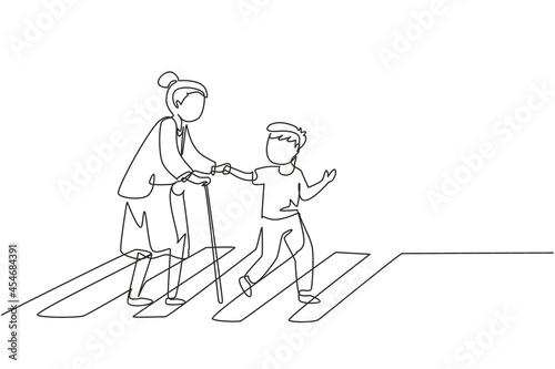 Single continuous line drawing polite boy help grandmother cross street. Well mannered child assistance to aged woman. Kid and elderly female go on crosswalk together. One line graphic design vector