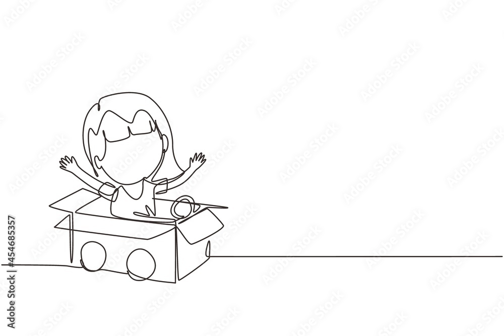 Continuous one line drawing girl driving cardboard car. Happy child ride on toy car made of