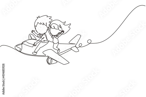 Single continuous line drawing little boys and girls riding plane. Happy kids on airplane. Children riding airplane, summer journey, travel concept. One line draw graphic design vector illustration