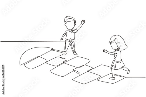 Single continuous line drawing little girl and boy playing hopscotch at kindergarten yard. Happy kids hopping at playground. Hop scotch court drawn with chalk. One line draw graphic design vector