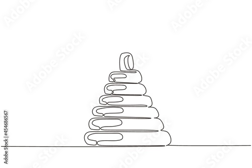 Single continuous line drawing children's plastic toy pyramid. Pyramid toy icon, Kids children stackable ring toy. Children pyramid or pile rings toy. One line draw graphic design vector illustration
