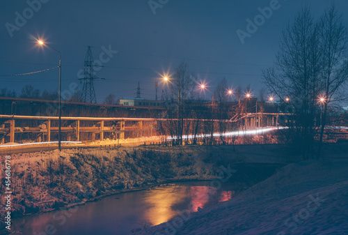 bridge over river among the industrial area 