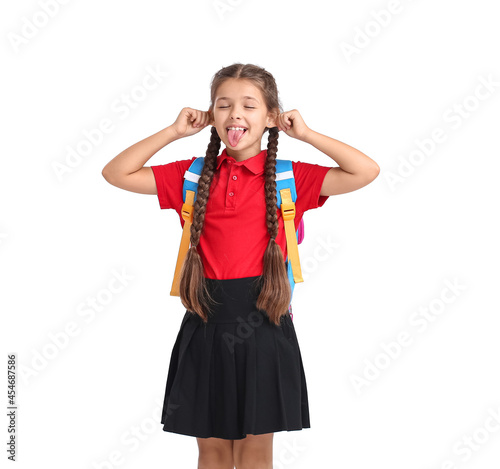 Принти на полотні Cute grimacing schoolgirl on white background