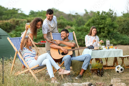 Young people at barbecue pa...