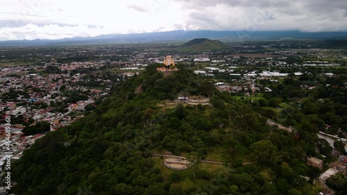 View of church and town in central mexico valley photo