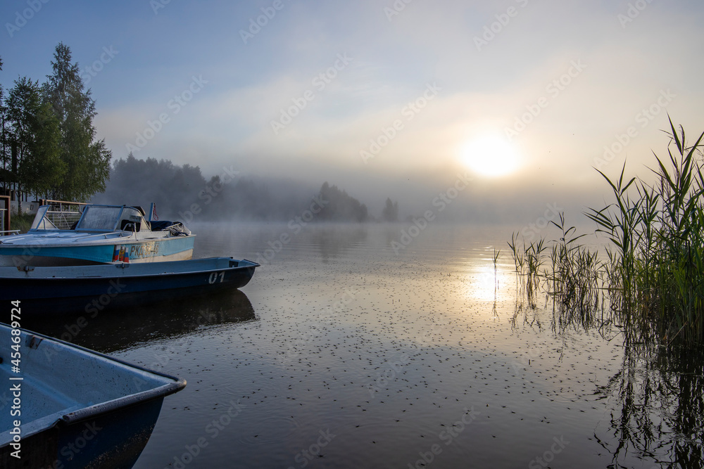 Early morning. Fog on the river. Beautiful sunrise in the summer by the river.River on an early summer morning at dawn. Early morning. Fog on the river. Beautiful sunrise in the summer by the river.River on an early summer morning at dawn.