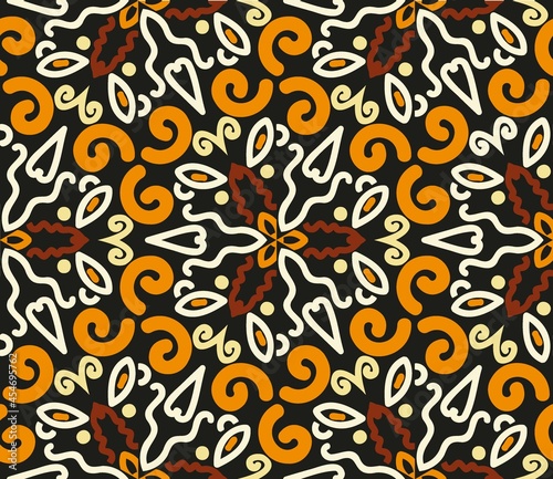 Seamless abstract ornament from Halloween colors. Leopard pattern. Orange  beige  brown and black for print design  wallpaper  background or texture. Vector illustration.