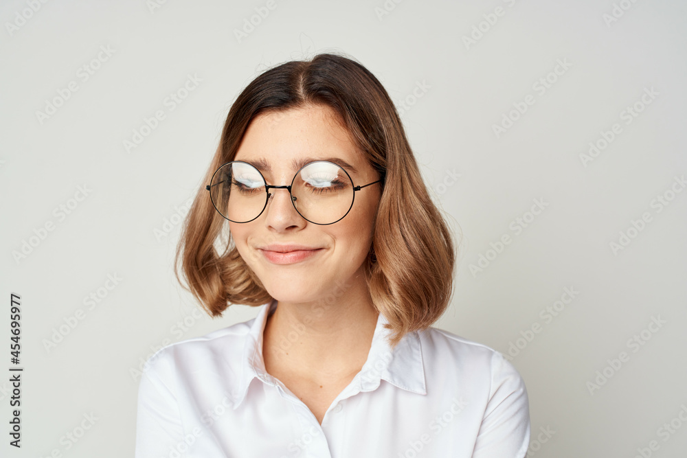 pretty woman in white shirt wearing glasses manager office work pretty woman in white shirt wearing glasses manager office work