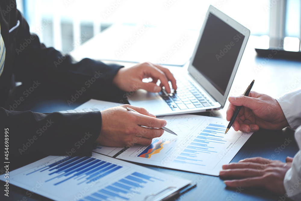 business people photo The feasibility of the project is being analyzed. with documents placed on the table and laptop business people photo The feasibility of the project is being analyzed. with documents placed on the table and laptop
