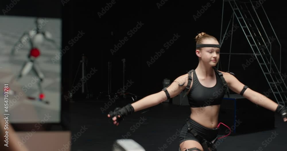 dancing woman wearing motion capture suit in studio ballet dancer girl wearing mo-cap suit for 3d character animation for virtual reality technology dancing woman wearing motion capture suit in studio ballet dancer girl wearing mo-cap suit for 3d character animation for virtual reality technology