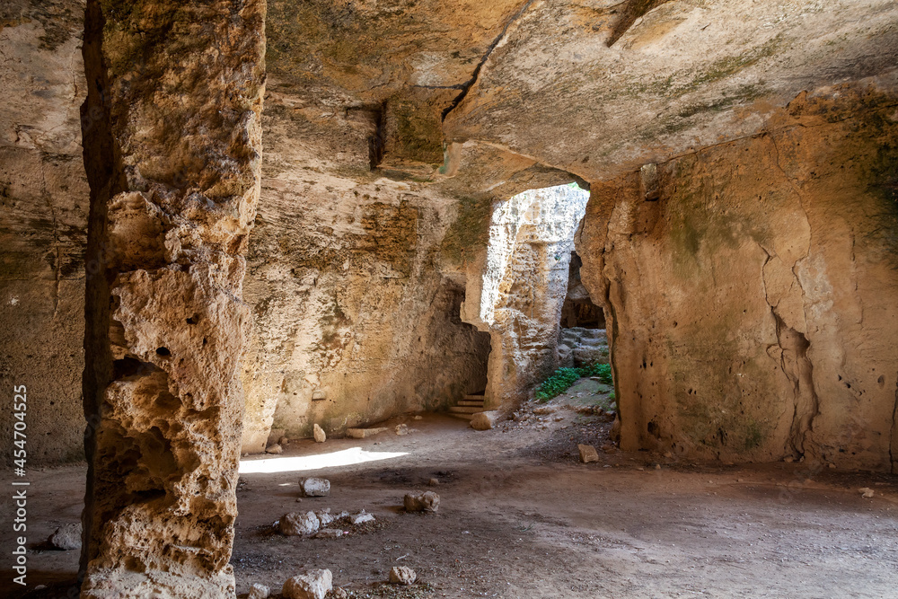 Christian Catacombs at Fabrica Hill, Paphos Cyprus, which were used as a refuge from Roman persecution which are a popular tourist holiday travel destination and attraction landmark, stock photo image