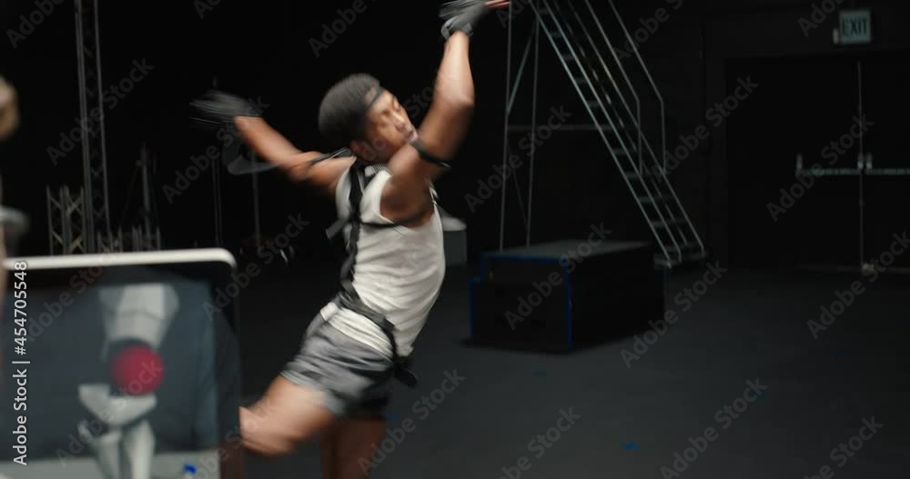 dancing man wearing motion capture suit in studio actor wearing mo-cap suit for 3d character animation for virtual reality technology dancing man wearing motion capture suit in studio actor wearing mo-cap suit for 3d character animation for virtual reality technology