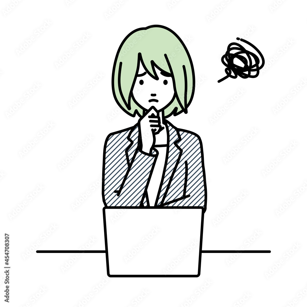デスクで座ってPCを開いて困っているスーツの女性