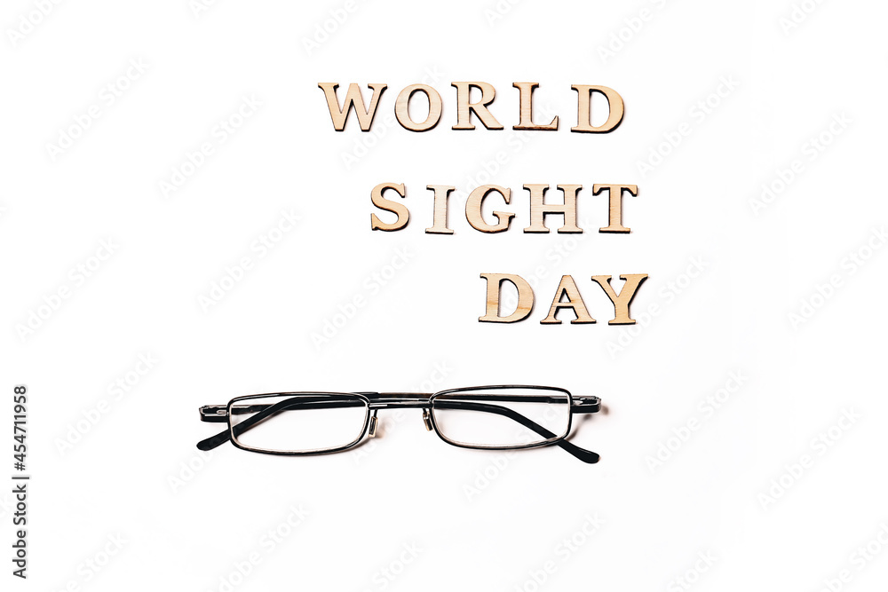 World Sight Day on 10th October. Copy Space. Glasses for improving vision. Flat lay. Top view. World Sight Day on 10th October. Copy Space. Glasses for improving vision. Flat lay. Top view.