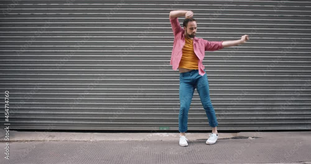 dance loop funny man dancing in street having fun celebrating with funky looping dance 4k dance loop funny man dancing in street having fun celebrating with funky looping dance 4k