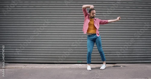 dance loop funny man dancing in street having fun celebrating with funky looping dance 4k