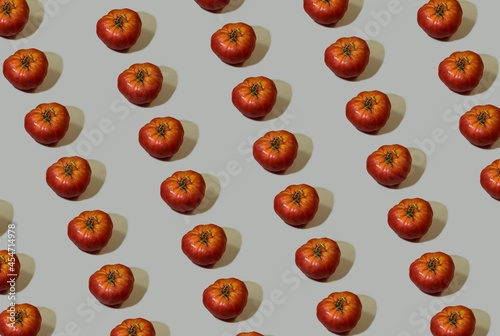 Background for the design and banner. Red tomatoes on a gray background. Pattern