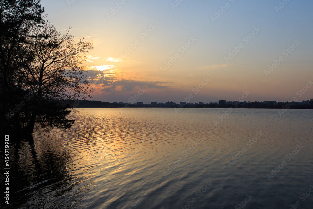 A beautiful sunset over the lake in Kyiv. Ukraine 