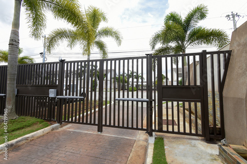 Fototapeta Naklejka Na Ścianę i Meble -  Residential entrance doors with automatic electronic motors