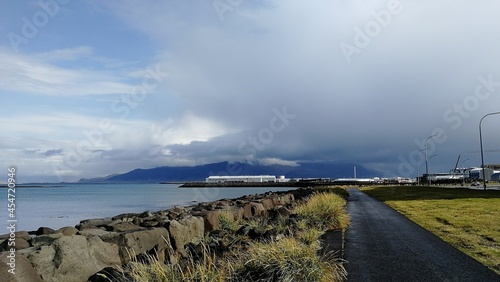 View of the city of Reykjavik against a cloudy sky