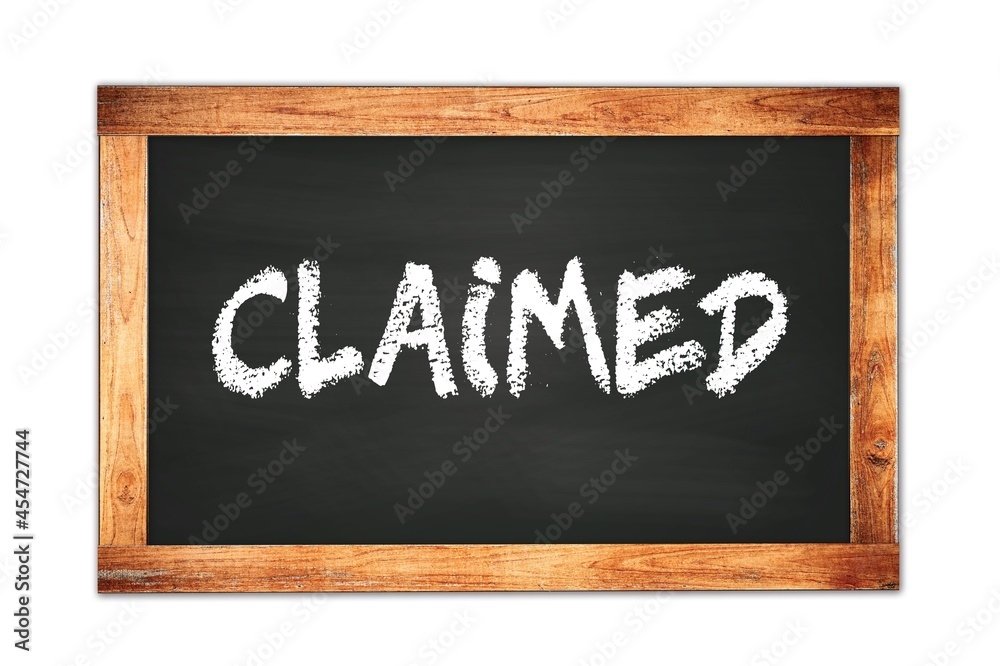 CLAIMED text written on wooden frame school blackboard. CLAIMED text written on wooden frame school blackboard.