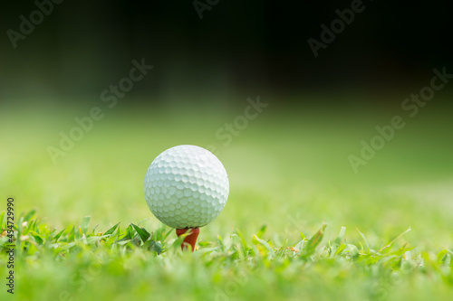 Close up of golf ball on tee,