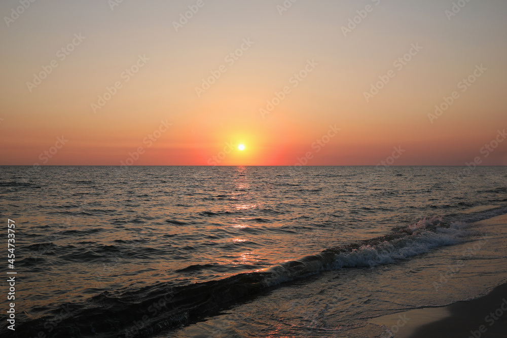 Picturesque view of beautiful sea at sunset