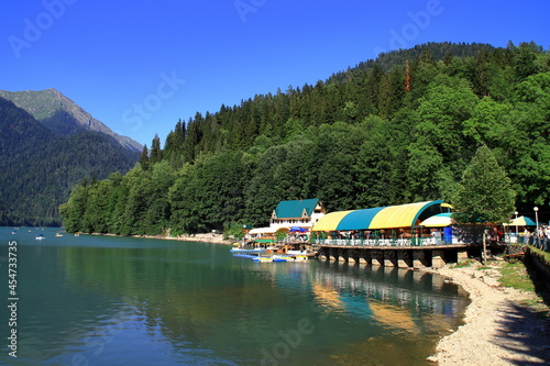 Photo of a cafe near a mountain lake