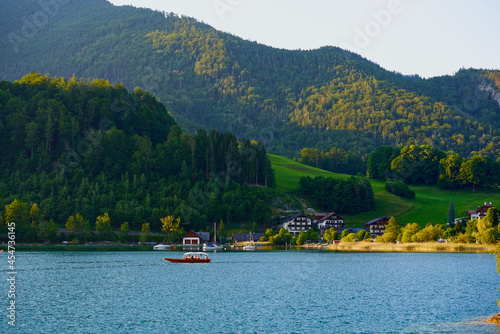 Pleasure boat on the lake Wolfgang. Austrian Alps, Salzburg region. © Trambitski