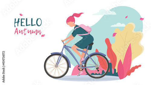 A girl rides a bicycle, a European woman rides a bicycle in the autumn landscape. Poster or banner for bike shop, sportswear or postcard