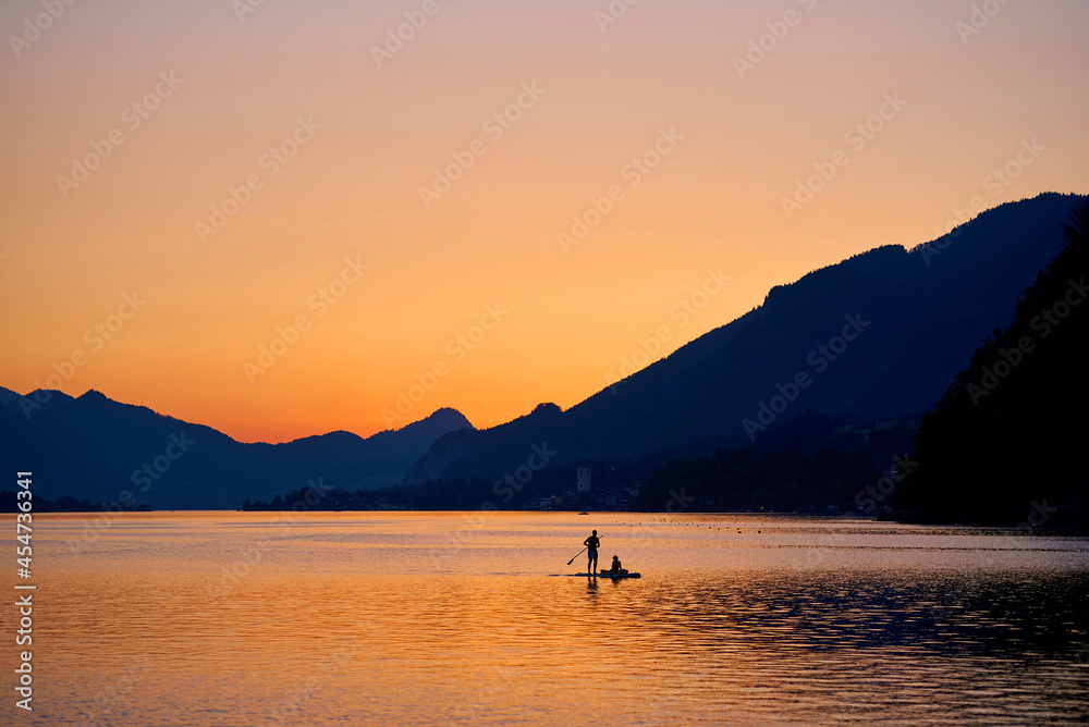 SUP surfing on lake Wolfgang.