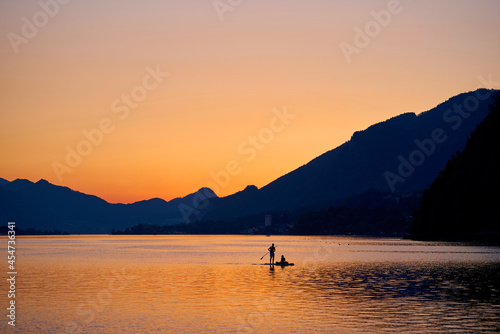 SUP surfing on lake Wolfgang.