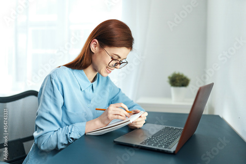 woman in front of laptop work fatigue lifestyle manager