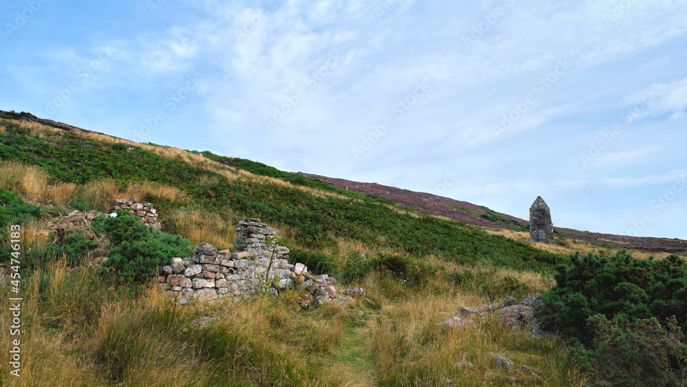 Naklejka premium Badbea Highland Clearances village ruins on the Caithness coast in the Highlands with the memorial to John Sutherland Badbea