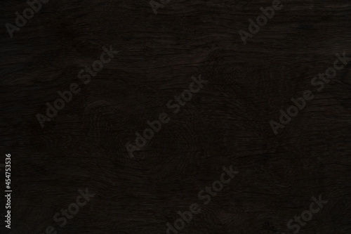 Dark brown wood wall vintage background and texture