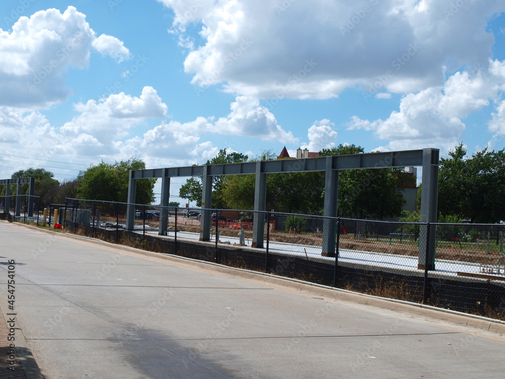 A new electric diesel train station under construction going to DFW International Airport Terminal A (second train in Terminal A )