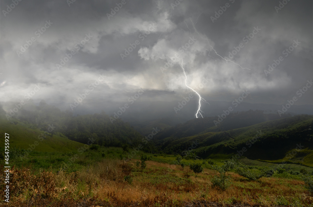 Strong lightning over the valley in monsoon season of Asia
