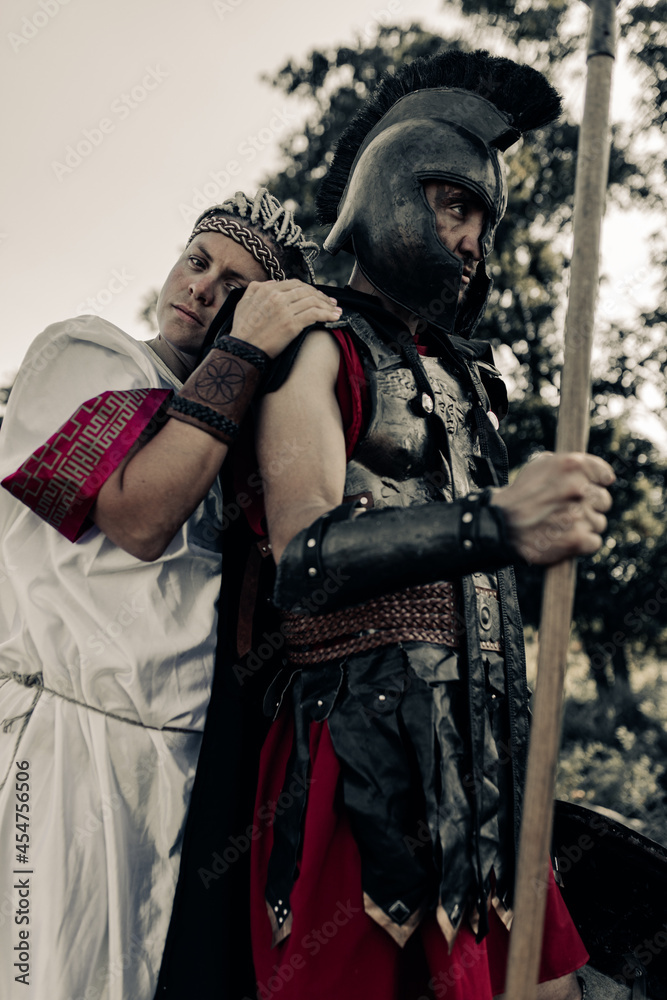 Ancient warrior says goodbye with his beloved woman before parting.