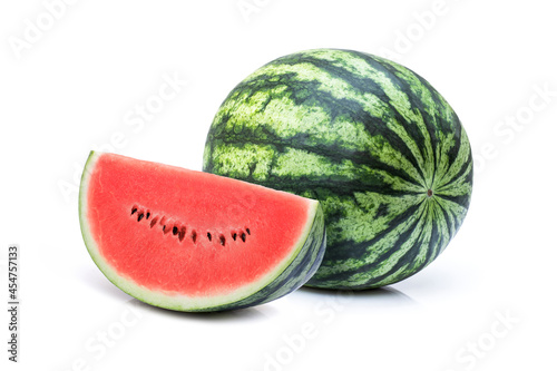 Watermelon with slices isolated on white background.