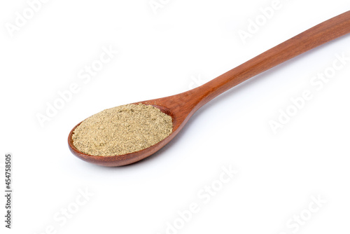 Pepper powder in wooden spoon isolated on white background. Clipping path.