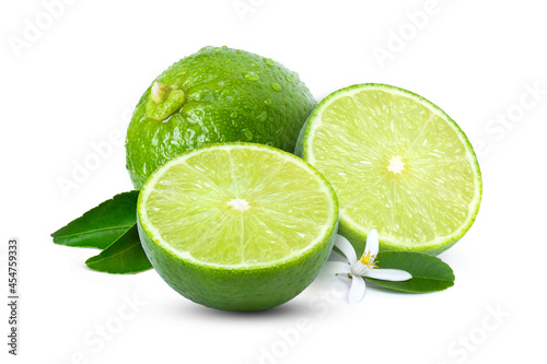 Lime fruits with green leaf and flower isolated on white background. 